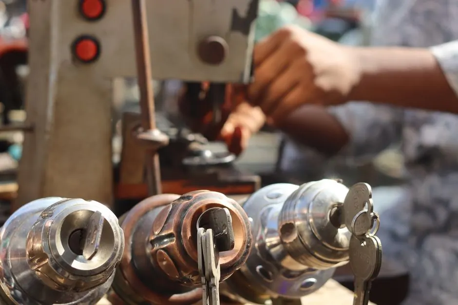 Locksmith using extraction tools to remove a broken key from a lock in Waxhaw, NC